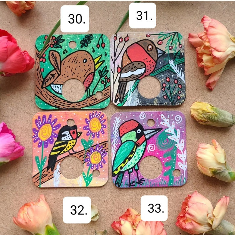 illustrations of birds on card floss drops