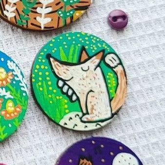 illustration of arctic fox on needle minder