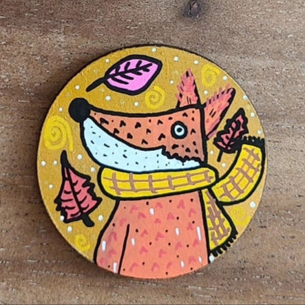 illustration of fox with scarf on needle minder