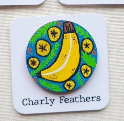 illustration of banana on large needle minder
