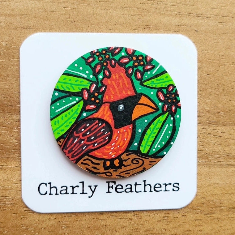 illustration of cardinal on large needle minder