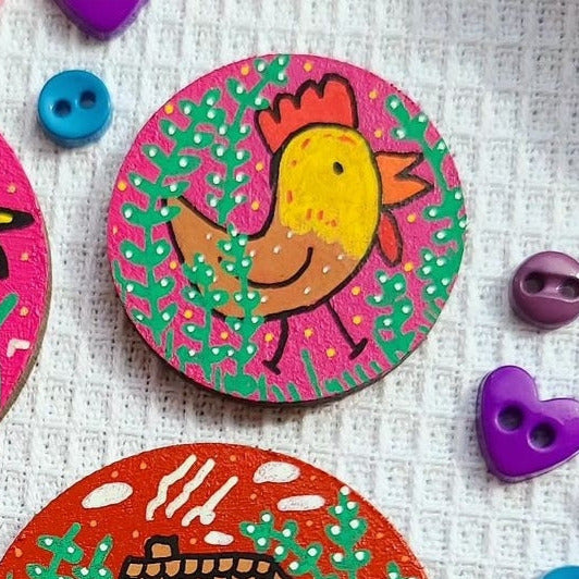 illustration of chicken on small needle minder