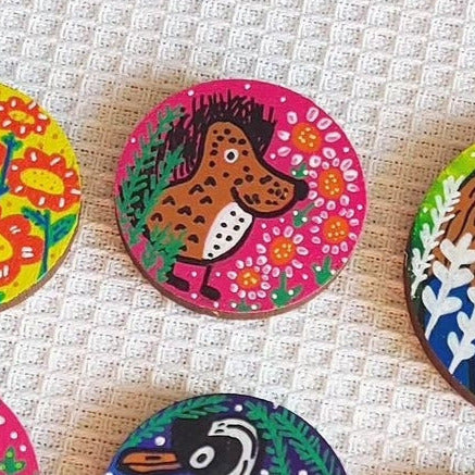 illustration of hedgehog on pink needle minder