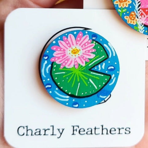 lily pad illustration on small needle minder
