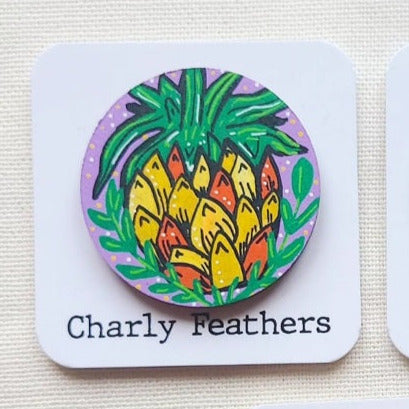 illustration of pineapple on large needle minder