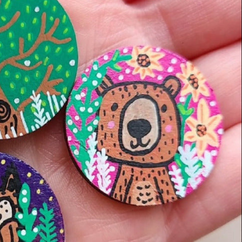bear illustration on small needle minder