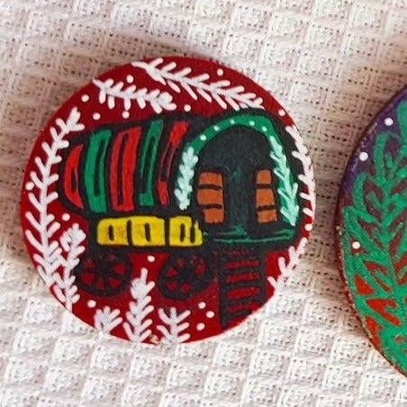 illustration of vintage caravan on red needle minder
